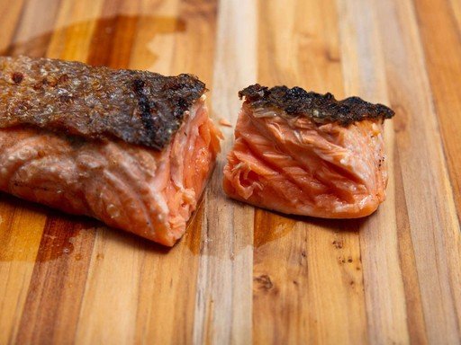 The photograph attached to the message: two pieces of cured salmon on a wooden board.